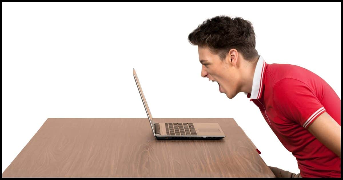 Individual yelling at their computer.