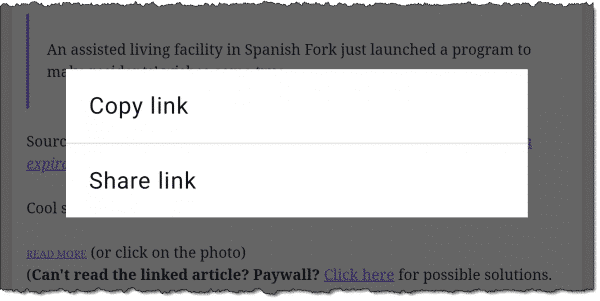 A long press on an email link on a mobile device.